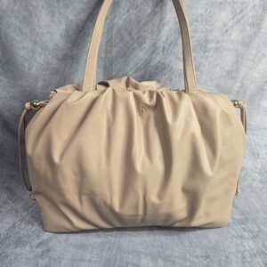 Victoria's Secret beige cinch-top tote bag
